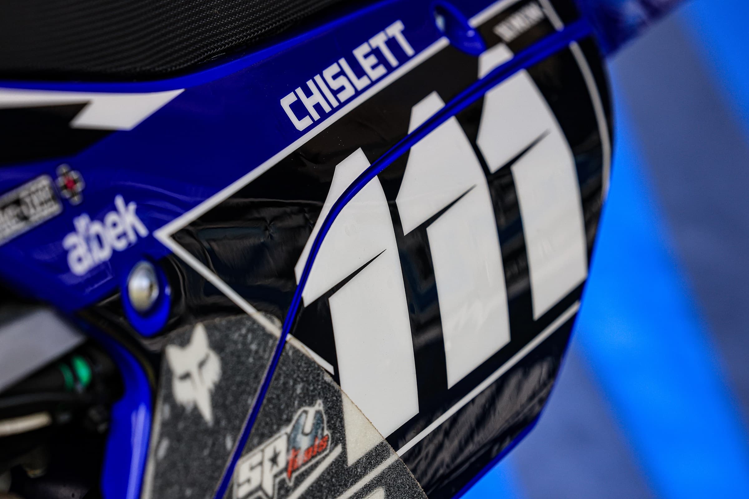 The JC111 number plate on Judd Chislett's Yamaha, showing sponsor decals